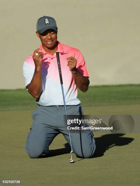 Tiger Woods reacts to his missed birdie putt on the 18th hole during the second round at the Arnold Palmer Invitational Presented By MasterCard at...