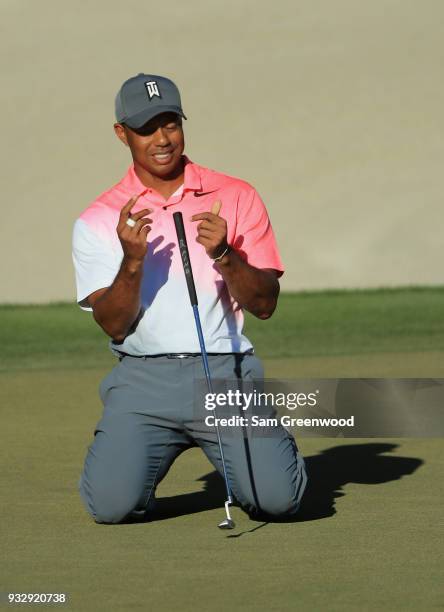 Tiger Woods reacts to his missed birdie putt on the 18th hole during the second round at the Arnold Palmer Invitational Presented By MasterCard at...