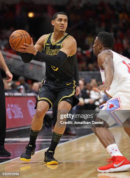 Derrick Williams of the Los Angeles Lakers moves against David Nwaba of the Chicago Bulls at the United Center on January 26, 2018 in Chicago,...