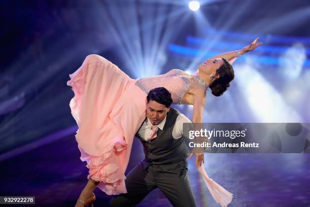 Judith Williams and Erich Klann perform on stage during the 1st show of the 11th season of the television competition 'Let's Dance' on March 16, 2018...