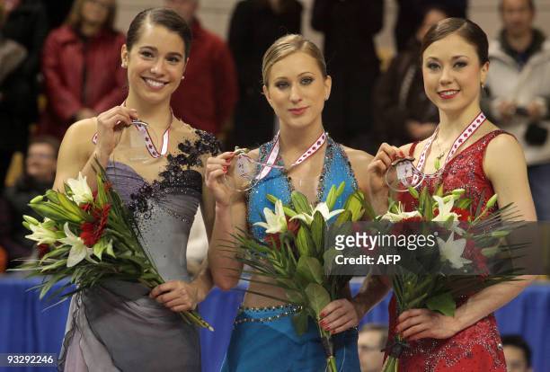 Joannie Rochette of Canada, celebrates her win in the Ladies competition of the the 2009 Homesense Skate Canada International in Kitchener, Ontario,...