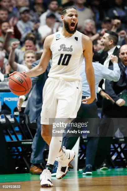 Caleb Martin of the Nevada Wolf Pack celebrates as they defeat the Texas Longhorns during the game in the first round of the 2018 NCAA Men's...