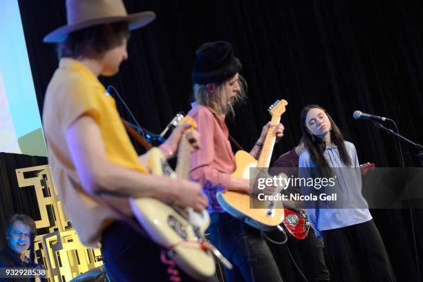 Hendrik Tammjarv, Lauri Raus, and Eliann Tulve of Holy Motors perform onstage at Friday International Artist Showcase at Flatstock during SXSW at...