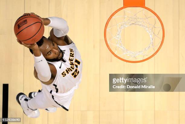 Shaquille Morris of the Wichita State Shockers goes up for a dunk against the Marshall Thundering Herd during the first round of the 2018 NCAA Men's...