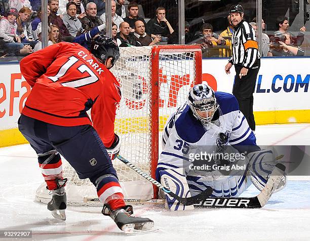 Chris Clark of the Washington Capitals is stopped in close by Vesa Toskala of the Toronto Maple Leafs during game action November 21, 2009 at the Air...
