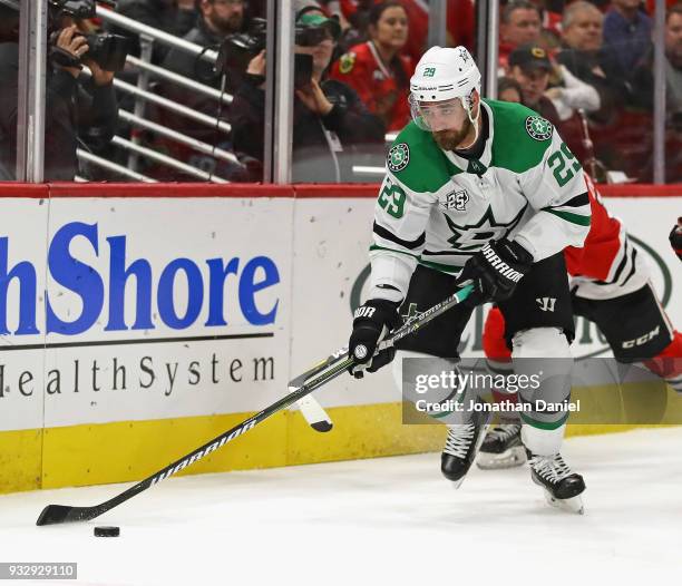 Greg Pateryn of the Dallas Stars controls the puck against the Chicago Blackhawks at the United Center on February 8 2018 in Chicago, Illinois. The...