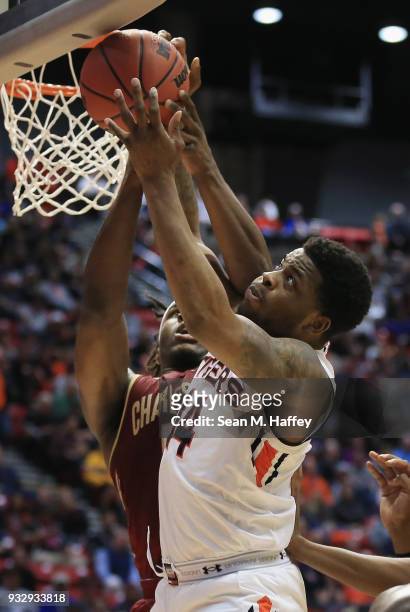 Malik Dunbar of the Auburn Tigers lays it up against Jarrell Brantley of the Charleston Cougars in the first half in the first round of the 2018 NCAA...