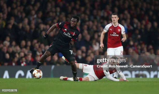 Milan's Franck Kessie and Arsenal's Aaron Ramsey during the Europa League Round of 16 Second Leg match between Arsenal and AC Milan at Emirates...