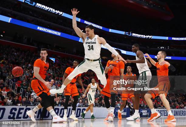 Gavin Schilling of the Michigan State Spartans loses the ball during the first half against the Bucknell Bison in the first round of the 2018 NCAA...