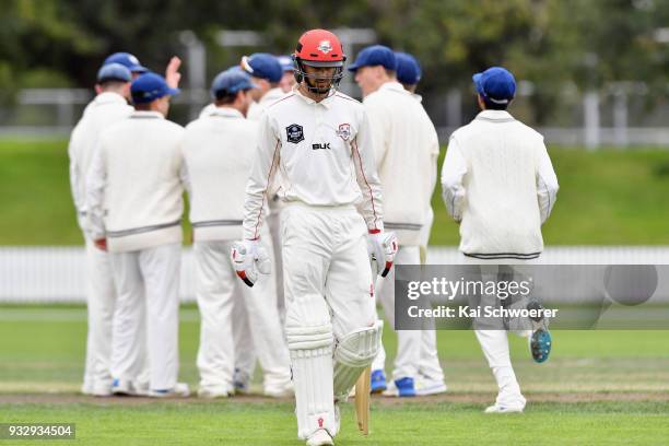 Chad Bowes of Canterbury looks dejected after being dismissed by Matt McEwan of the Auckland Aces during the Plunket Shield match between Canterbury...