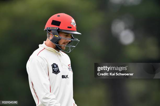 Chad Bowes of Canterbury looks dejected after being dismissed by Matt McEwan of the Auckland Aces during the Plunket Shield match between Canterbury...