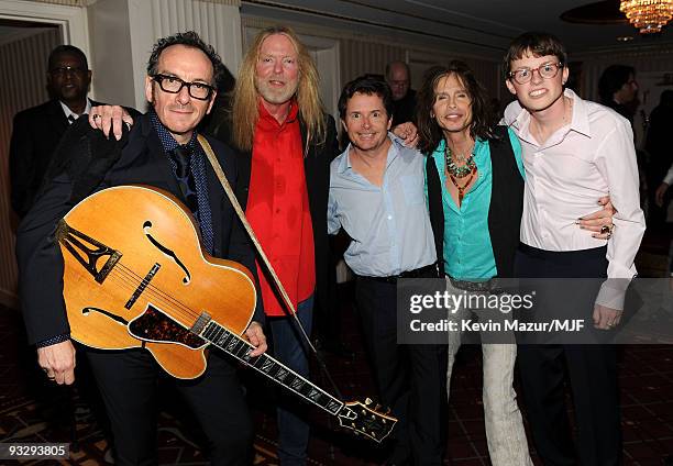 Elvis Costello, Gregg Allman, Michael J. Fox, Steven Tyler and Sam Fox pose backstage during The Michael J. Fox Foundation�s 2009 Benefit, "A Funny...