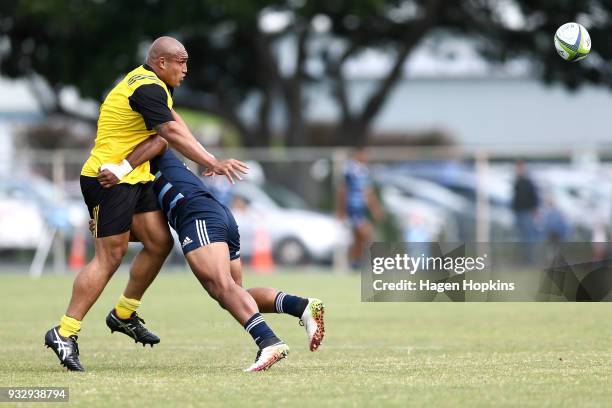 Marcel Renata of the Hurricanes is tackled during the development squad trial match between the Hurricanes and the Blues at Evans Bay Park on March...
