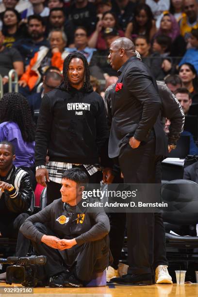 Magic Johnson greets Todd Gurley during the Los Angeles Lakers v Cleveland Cavaliers game on March 11, 2018 at STAPLES Center in Los Angeles,...