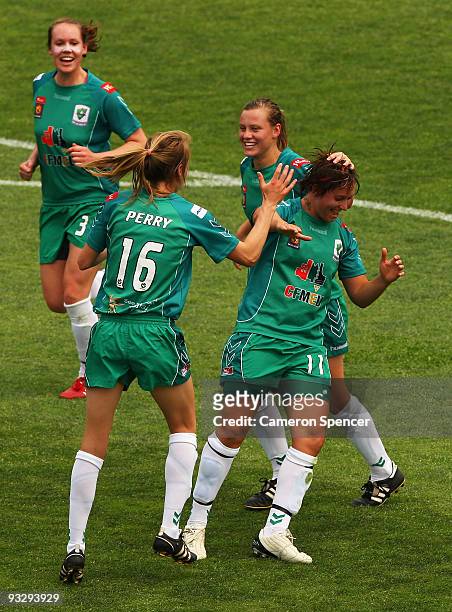 Cian Maciejewski of Canberra celebrates scoring a goal with team mates during the round eight W-League match between the Newcastle Jets and Canberra...