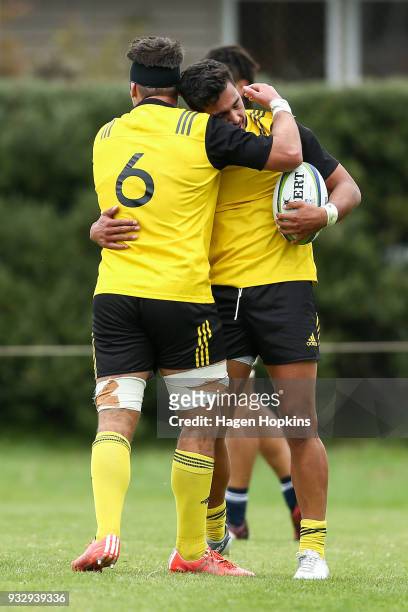 Billy Proctor of the Hurricanes celebrates with Sam Henwood after scoring a try during the development squad trial match between the Hurricanes and...