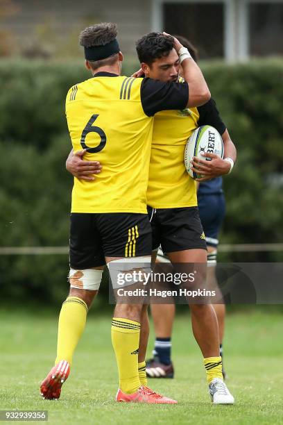 Billy Proctor of the Hurricanes celebrates with Sam Henwood after scoring a try during the development squad trial match between the Hurricanes and...