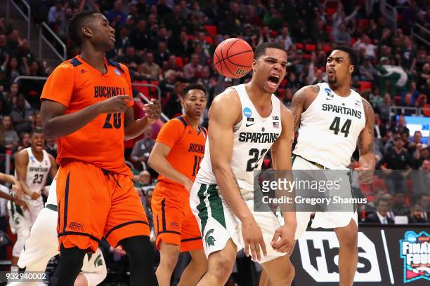 Miles Bridges of the Michigan State Spartans reacts during the second half against the Bucknell Bison in the first round of the 2018 NCAA Men's...