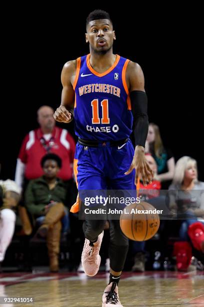 Sekou Wiggs of the Westchester Knicks dribbles the ball down court against the Windy City Bulls on March 16, 2018 at the Sears Centre Arena in...