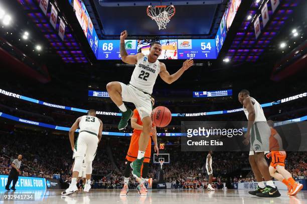 Miles Bridges of the Michigan State Spartans dunks the ball during the second half against the Bucknell Bison in the first round of the 2018 NCAA...