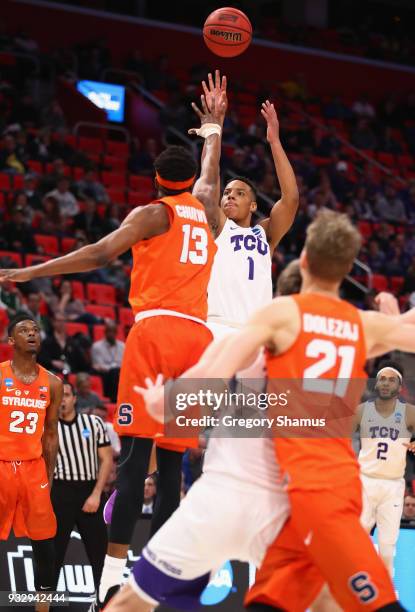 Desmond Bane of the TCU Horned Frogs shoots the ball during the first half against Paschal Chukwu of the Syracuse Orange in the first round of the...