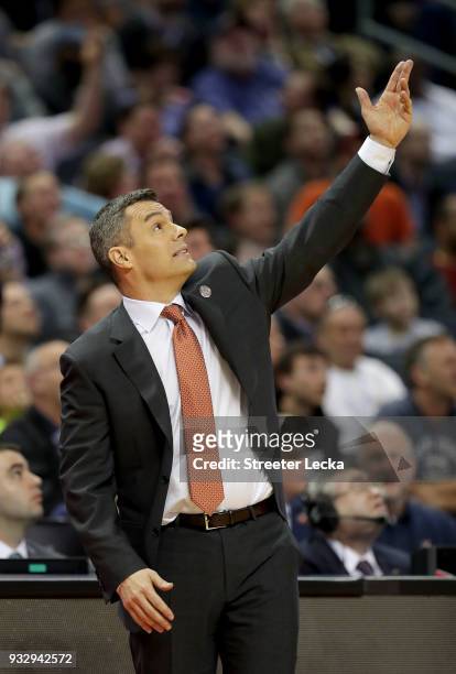 Head coach Tony Bennett of the Virginia Cavaliers looks to the scoreboard against the UMBC Retrievers during the first round of the 2018 NCAA Men's...