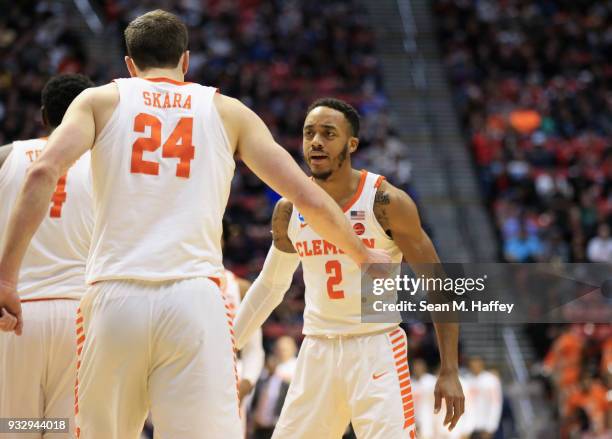 David Skara and Marcquise Reed of the Clemson Tigers reacts as they take on the New Mexico State Aggies in the first half in the first round of the...