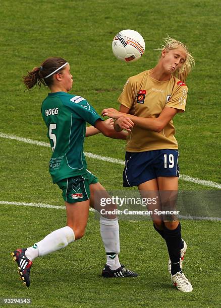 Kahlia Hogg of Canberra and Tara Andrews of the Jets head the ball during the round eight W-League match between the Newcastle Jets and Canberra...