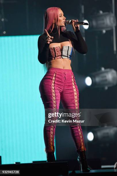 Iggy Azalea performs onstage during the Demi Lovato "Tell Me You Love Me" World Tour at Barclays Center of Brooklyn on March 16, 2018 in New York...