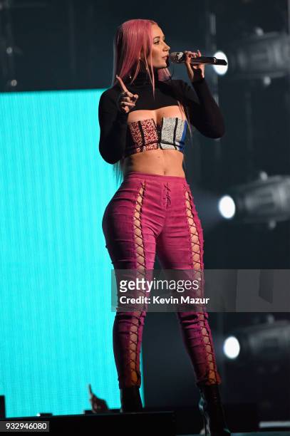 Iggy Azalea performs onstage during the Demi Lovato "Tell Me You Love Me" World Tour at Barclays Center of Brooklyn on March 16, 2018 in New York...