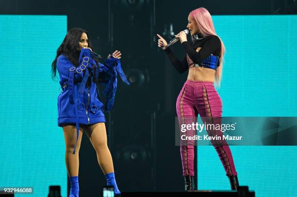 Demi Lovato and Iggy Azalea perform onstage during the "Tell Me You Love Me" World Tour at Barclays Center of Brooklyn on March 16, 2018 in New York...