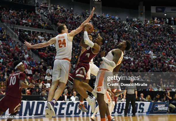 Harris of the New Mexico State Aggies shoots against David Skara of the Clemson Tigers in the first half in the first round of the 2018 NCAA Men's...