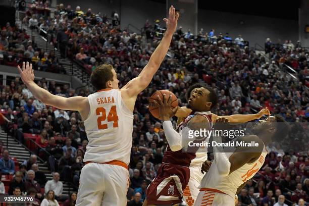 Harris of the New Mexico State Aggies shoots against David Skara of the Clemson Tigers in the first half in the first round of the 2018 NCAA Men's...