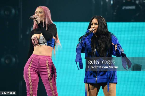 Iggy Azalea and Demi Lovato perform onstage during the "Tell Me You Love Me" World Tour at Barclays Center of Brooklyn on March 16, 2018 in New York...