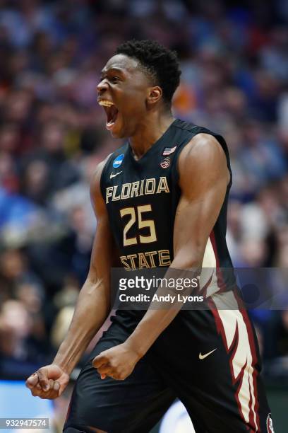 Mfiondu Kabengele of the Florida State Seminoles reacts against the Missouri Tigers during the game in the first round of the 2018 NCAA Men's...