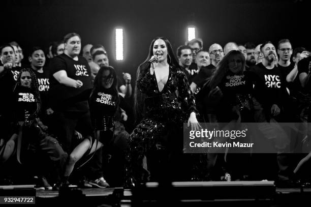 Demi Lovato performs onstage with the New York City Gay Men's Chorus during the "Tell Me You Love Me" World Tour at Barclays Center of Brooklyn on...