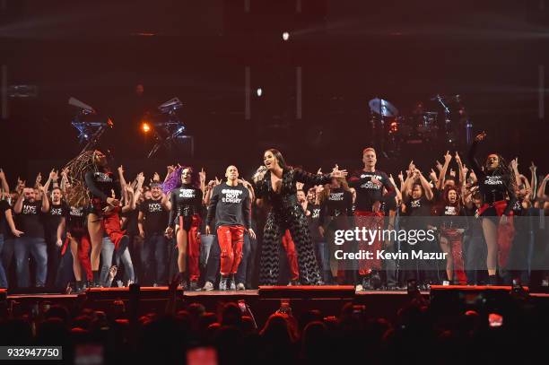 Demi Lovato performs onstage with the New York City Gay Men's Chorus during the "Tell Me You Love Me" World Tour at Barclays Center of Brooklyn on...