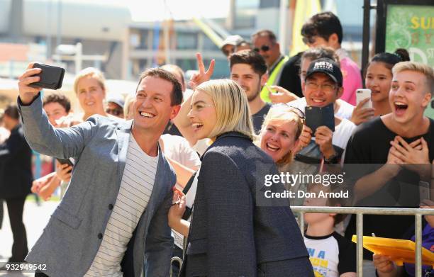 Rove McManus takes a selfie with Margot Robbie during the Peter Rabbit Australian Premiere on March 17, 2018 in Sydney, Australia.