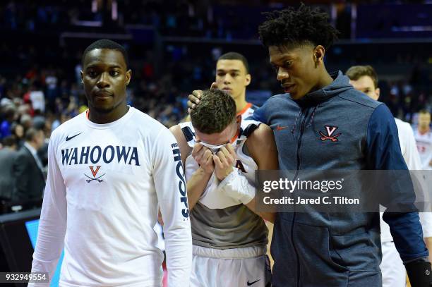 Kyle Guy of the Virginia Cavaliers exits the court after their 74-54 loss to the UMBC Retrievers during the first round of the 2018 NCAA Men's...