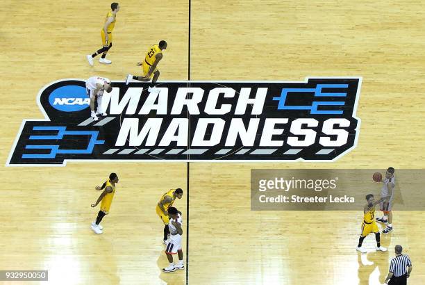 The UMBC Retrievers celebrate their 74-54 victory over the Virginia Cavaliers during the first round of the 2018 NCAA Men's Basketball Tournament at...