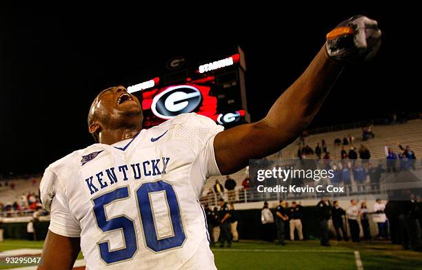 Sam Maxwell of the Kentucky Wildcats celebrates after their 34-27 win over the Georgia Bulldogs in the final minutes at Sanford Stadium on November...