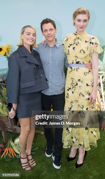 Actress Margot Robbie (left and Elizabeth Debicki join director Will Gluck as they attend the Peter Rabbit Australian Premiere on March 17, 2018 in...