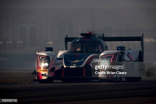 The ORECA LMP2 of Phil Hansen, of Great Britain, Paul Di Resta, of Great Britain, and Alex Brundle, of Great Britain, drives on the track through...