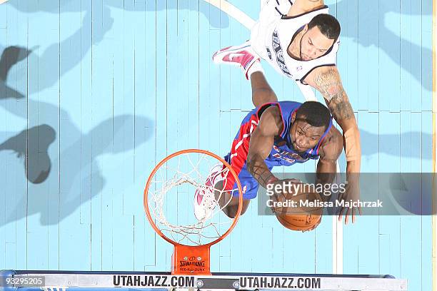 Deron Williams of the Utah Jazz goes up to block Will Bynum of the Detroit Pistons at EnergySolutions Arena on November 21, 2009 in Salt Lake City,...