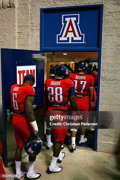 The Arizona Wildcats walk into the locker room following warm ups to the college football game against the Oregon Ducks at Arizona Stadium on...