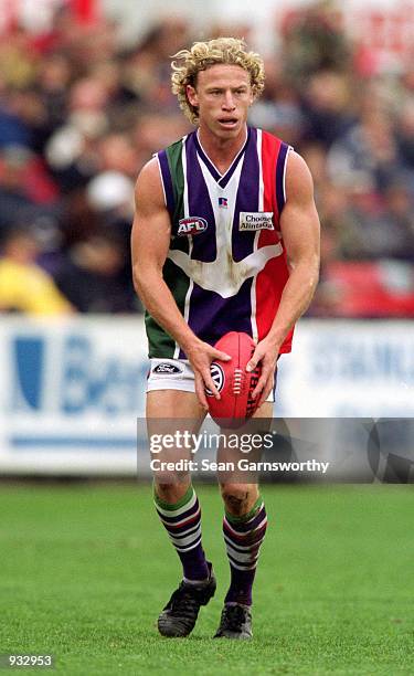 Shaun McManus for Fremantle in action during the round 16 AFL match played between the Carlton Blues and the Fremantle Dockers held at Optus Oval,...