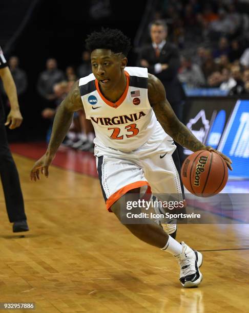 Virginia Cavaliers guard Nigel Johnson drives to the basket during the NCAA Division I Men's Championship First Round game between the UMBC...