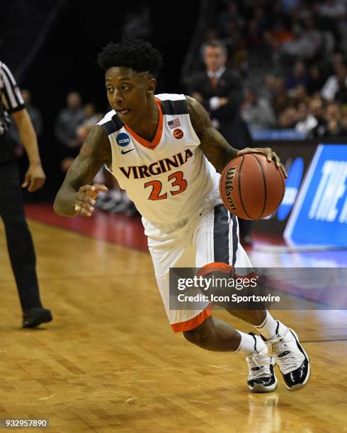 Virginia Cavaliers guard Nigel Johnson drives to the basket during the NCAA Division I Men's Championship First Round game between the UMBC...