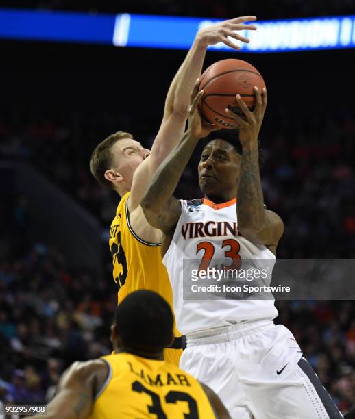 Virginia Cavaliers guard Nigel Johnson shoots during the NCAA Division I Men's Championship First Round game between the UMBC Retrievers and the...