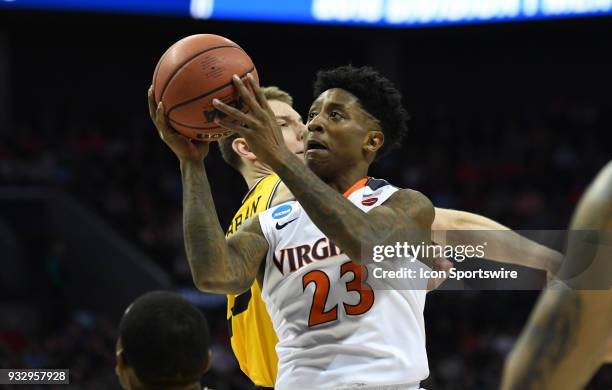 Virginia Cavaliers guard Nigel Johnson shoots during the NCAA Division I Men's Championship First Round game between the UMBC Retrievers and the...